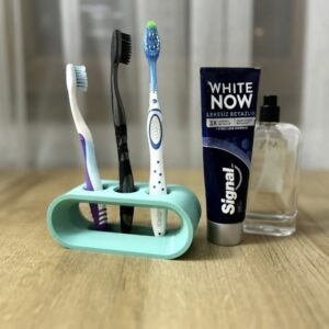 Compliant Mechanism Toothbrush Holder – 3D Printable Self-Gripping Bathroom Accessory